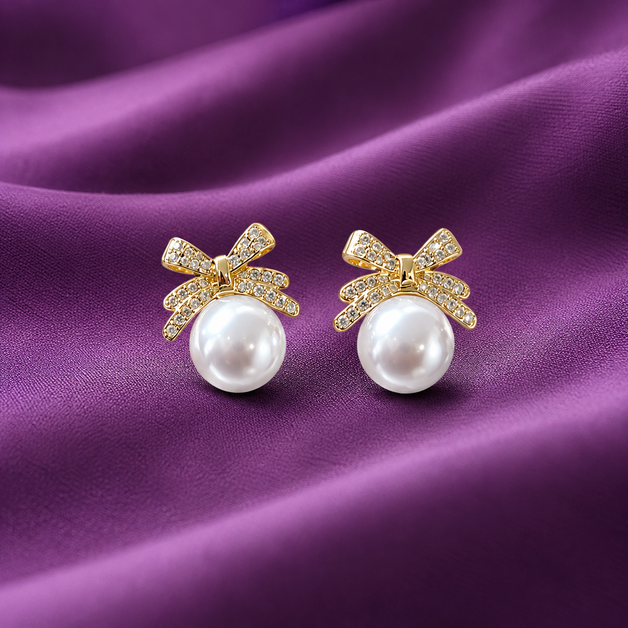 Pearl Earrings with Crystal Bow Design