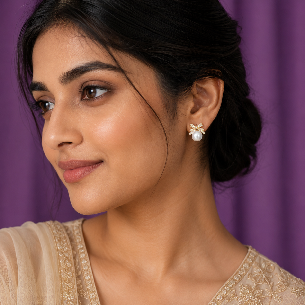 Pearl Earrings with Crystal Bow Design
